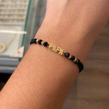 Pulsera Negra Papa Bolas 3mm Oro Amarillo*