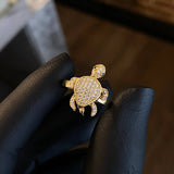 Anillo Tortuga Articulada 3.3gr T5 3/4 Circones Blancos Negros Oro Amarillo